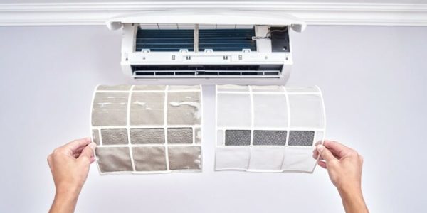 close-up-of-a-clean-and-dirty-filter-home-air-conditioner-replacement-picture-id1292606122-1